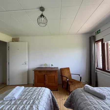 Metsaesydaen Huonemajoitus