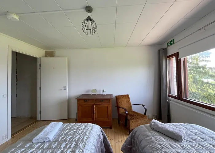 Metsaesydaen Huonemajoitus